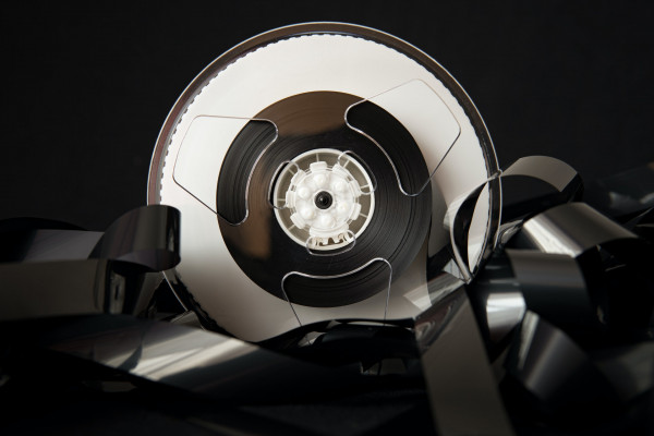 Retro plastic bobbin with film